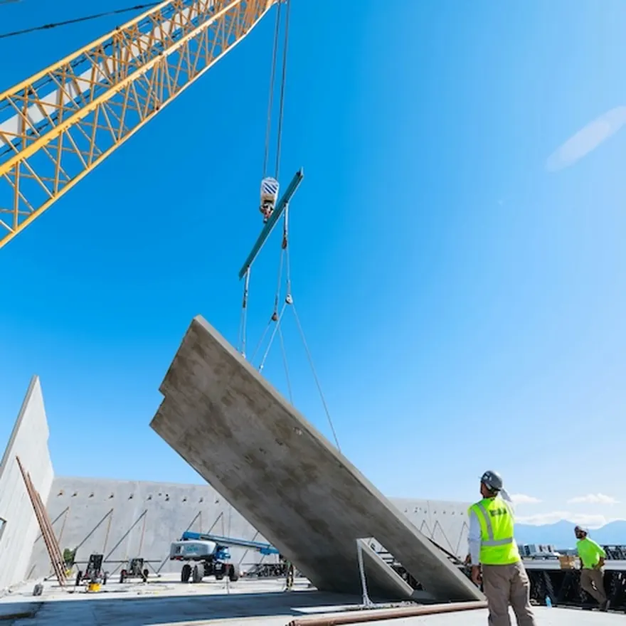 Crane lifting a tilt-up concrete panel